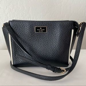 Kate Spade Black/white trim leather purse in excellent condition, with dust bag!